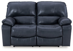 Focus on function. This practical power reclining loveseat balances contemporary character and irresistible comfort. Its affordable, expertly matched leather and faux leather upholstery keeps your style up to speed without breaking the bank. Reclining wit