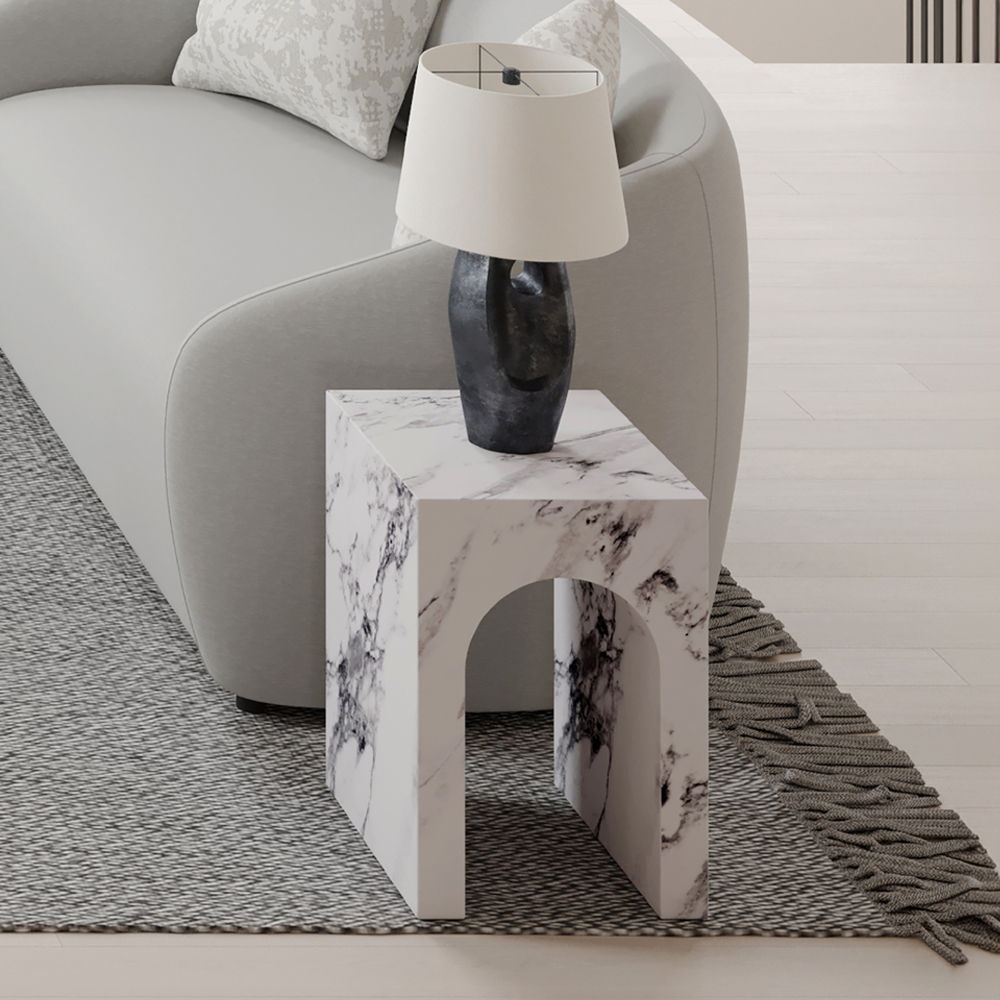 Introducing the Fritzy collection, a masterpiece of modern elegance in a striking white finish. These pieces, characterized by clean lines and a chic aesthetic, elevate any living space with their sophisticated presence. The coffee table and the uniquely 