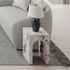 Introducing the Fritzy collection, a masterpiece of modern elegance in a striking white finish. These pieces, characterized by clean lines and a chic aesthetic, elevate any living space with their sophisticated presence. The coffee table and the uniquely 