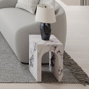 Introducing the Fritzy collection, a masterpiece of modern elegance in a striking white finish. These pieces, characterized by clean lines and a chic aesthetic, elevate any living space with their sophisticated presence. The coffee table and the uniquely 