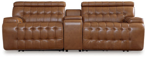 A mid-century modern update to a retro classic, this sectional is generously adaptable. Its combination of skillfully matched leather and faux leather upholstery exudes luxury and elegance. Deep seat cushions with dramatic tufting beckon you to relax and 