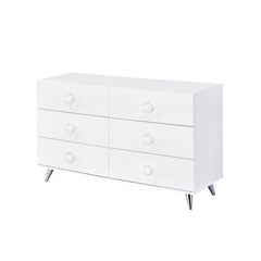 Sleek, modern, and functional are what best describe the Perse collection. The crisp white finish gives off the illusion of a bigger room. The low-profile panel bed features a storage headboard to display various goods. The case goods offer plenty of stor