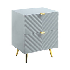 The Gaines Collection is a glamorous and sophisticated grouping that adds a chic style to any room. The gray gloss finish and gold metal accents help to accentuate the clean lines of the pieces and add a pop of glamour. The diagonal line design adds visua