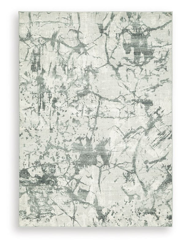 Make a statement that effortlessly complements your modern sensibilities. This rug adds an intentionally curated feel underfoot, with versatile shades of gray forming an intriguing abstract design. Crafted with comfort and convenience in mind, this soft f