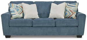 Need a simple style refresh? Liven up your living room essentials with this sofa. A chunky silhouette holds invitingly ample cushioning youâ€™ll long to lounge in. Crosshatched upholstery and accent pillows give the otherwise casual design a delightful vi