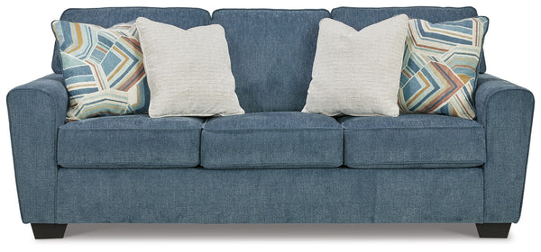 Need a simple style refresh? Liven up your living room essentials with this sofa. A chunky silhouette holds invitingly ample cushioning youâ€™ll long to lounge in. Crosshatched upholstery and accent pillows give the otherwise casual design a delightful vi