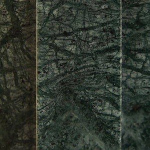  crafted from rich green marble with subtle goldtone metal accents
