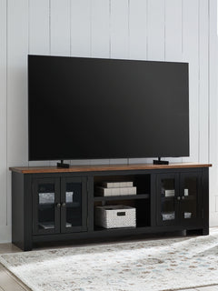 Raise the bar on modern farmhouse style with the Wildenauer TV stand. Its sturdy silhouette and casual good looks are accentuated with a two-tone finish, which pairs a warm satin black base with a contrasting butcher block veneer top. Glass door cabinets 