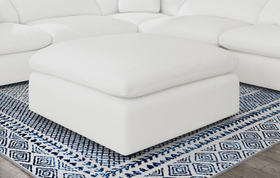 Introduce impeccable comfort with a modern ottoman that coordinates with your modular sectional sofa. This accent piece features neutral water-resistant boucle upholstery for an on-trend look and feel that works in a variety of homes and living spaces. Th