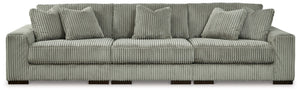 Plush and posh. Showcase your eye for on-trend texture with the statement-making cord upholstery of this sectional sofa. Its stunningly soft fabric entices in a warm neutral hue, complementing contemporary color palettes. Sink into the cushions and plan t