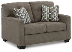 Reliable comfort, reimagined. Suitable for a variety of spaces, this loveseat invites you to say hello to approachable, everyday style. It expertly balances classic details, like a tufted back, with a contemporary structure. Satisfyingly soft, multi-hued 