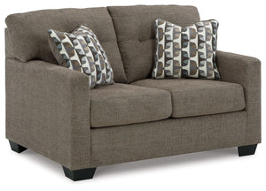 Reliable comfort, reimagined. Suitable for a variety of spaces, this loveseat invites you to say hello to approachable, everyday style. It expertly balances classic details, like a tufted back, with a contemporary structure. Satisfyingly soft, multi-hued 