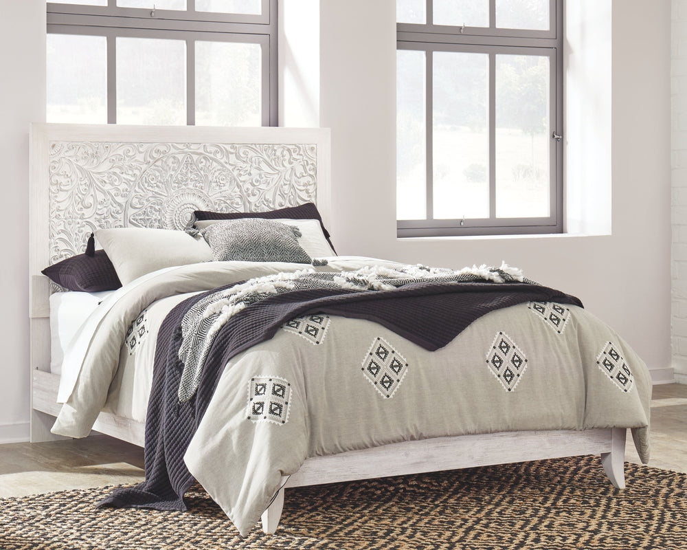 Your young trendsetter can live out her free spirit with this uniquely chic queen bed. Exquisite carved medallion pattern is a testament to true style. Charming whitewashed finish sets a foundation for a room bursting with personality. Headboard legs have