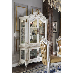 Curio Cabinet STORAGE: TOP) 2 Glass Doors (3 Compartments with 2 Glass Shelves, Mirrored Back), Touch Light BASE) 2 Glass Doors (2 Compartments with 1 Glass Shelf, Mirrored Back) Oversized Crown, Raised Moldings, and Scrolled Motifs (Poly-Resin) Glass Thi