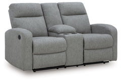 Everyday relaxation, made easy. This reclining loveseat takes you back to the basics with simply stylish comfort. With an easygoing neutral hue and classic design, it seamlessly adapts to your living room aesthetic. Pull tab reclining effortlessly takes y