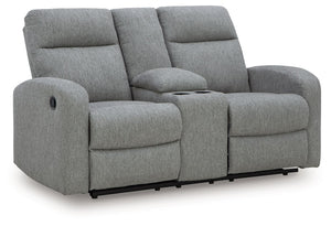 Everyday relaxation, made easy. This reclining loveseat takes you back to the basics with simply stylish comfort. With an easygoing neutral hue and classic design, it seamlessly adapts to your living room aesthetic. Pull tab reclining effortlessly takes y