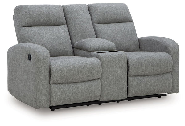 Everyday relaxation, made easy. This reclining loveseat takes you back to the basics with simply stylish comfort. With an easygoing neutral hue and classic design, it seamlessly adapts to your living room aesthetic. Pull tab reclining effortlessly takes y