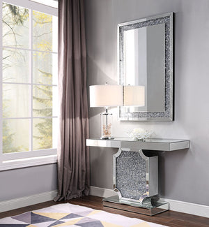 The Noralie Console Table will add a contemporary touch to any room in your home. With its clean lines, this brilliant rectangular occasional table showcases a distinctive style for an intriguing look. The table features a fully mirrored beveled table top
