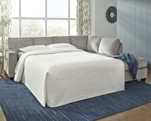  then this sleeper sectional is the answer. Sporting clean lines and sleek track arms