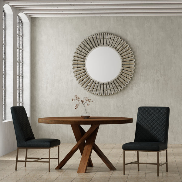 Bring a touch of global-inspired elegance to your dining room with the 60 Inch Round Dining Table. This handcrafted table is made from solid mango, giving it a unique aesthetic with natural variations of color, wood grain, and knots. The round table is pa