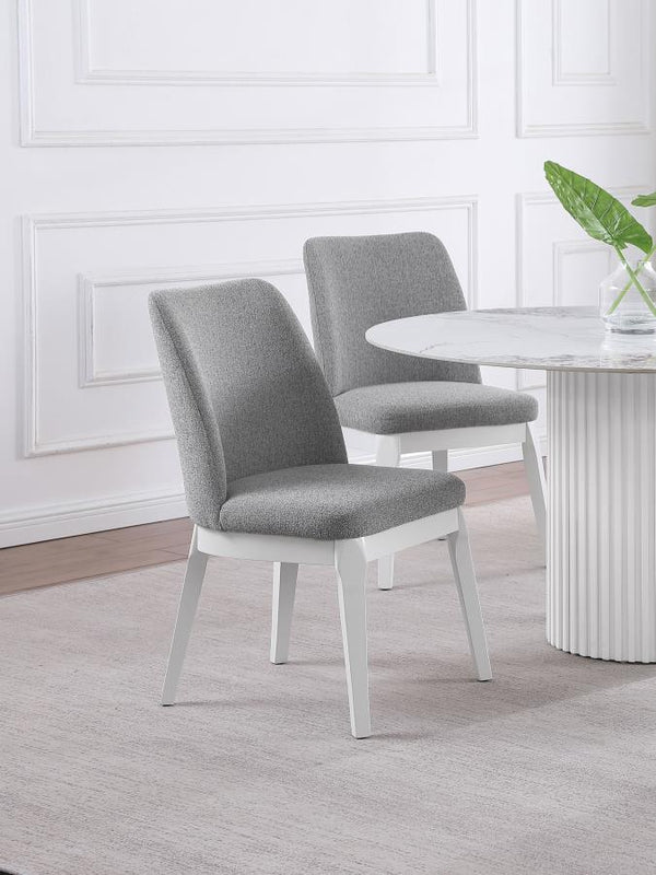  airy sensibility with a set of two modern dining chairs. Each side chair offers excellent comfort and support