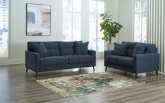 Feed your mid-century modern nostalgiaâ€”with a contemporary twist. A vibrant trend-right hue and comfy feel make this sofa and loveseat set perfect for lounging solo or with friends and family. Its linear profile adds plenty of fresh style, and the taper