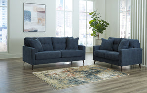Feed your mid-century modern nostalgiaâ€”with a contemporary twist. A vibrant trend-right hue and comfy feel make this sofa and loveseat set perfect for lounging solo or with friends and family. Its linear profile adds plenty of fresh style, and the taper