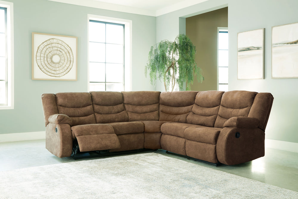 Affordable luxury made easy. An essential for living room lounging, this sectional is a star in social spaces. Its warm brown faux leather is well-suited for mixing and matching with your existing pieces. Pull tab reclining keeps you and your companions c