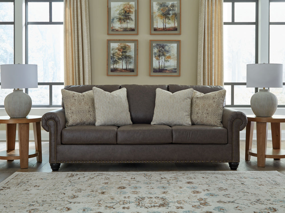 This sofa marries classic character with a contemporary attitude. Love the timeless look of leather? Its take on deep brown faux leather is versatile enough to pair with styles from traditional to modern, at a price that wonâ€™t break the bank. Details li