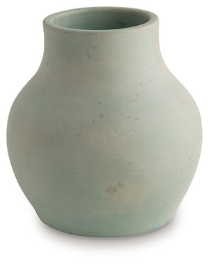 Bring a touch of rustic charm and casual elegance to your home with this terra cotta vase. The antiqued green finish gives it a beautifully weathered look, adding character to your creatively curated space. Let the piece shine on its own, or change things