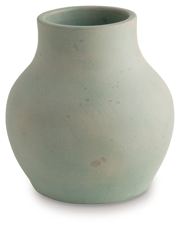Bring a touch of rustic charm and casual elegance to your home with this terra cotta vase. The antiqued green finish gives it a beautifully weathered look, adding character to your creatively curated space. Let the piece shine on its own, or change things