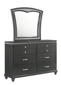 This elegant bedroom collection exudes sophistication with its bold, modern design and luxurious finishes. The centerpiece, a plush upholstered bed, features a high, statement-making headboard with distinctive channel tufting and a shimmering border, offe