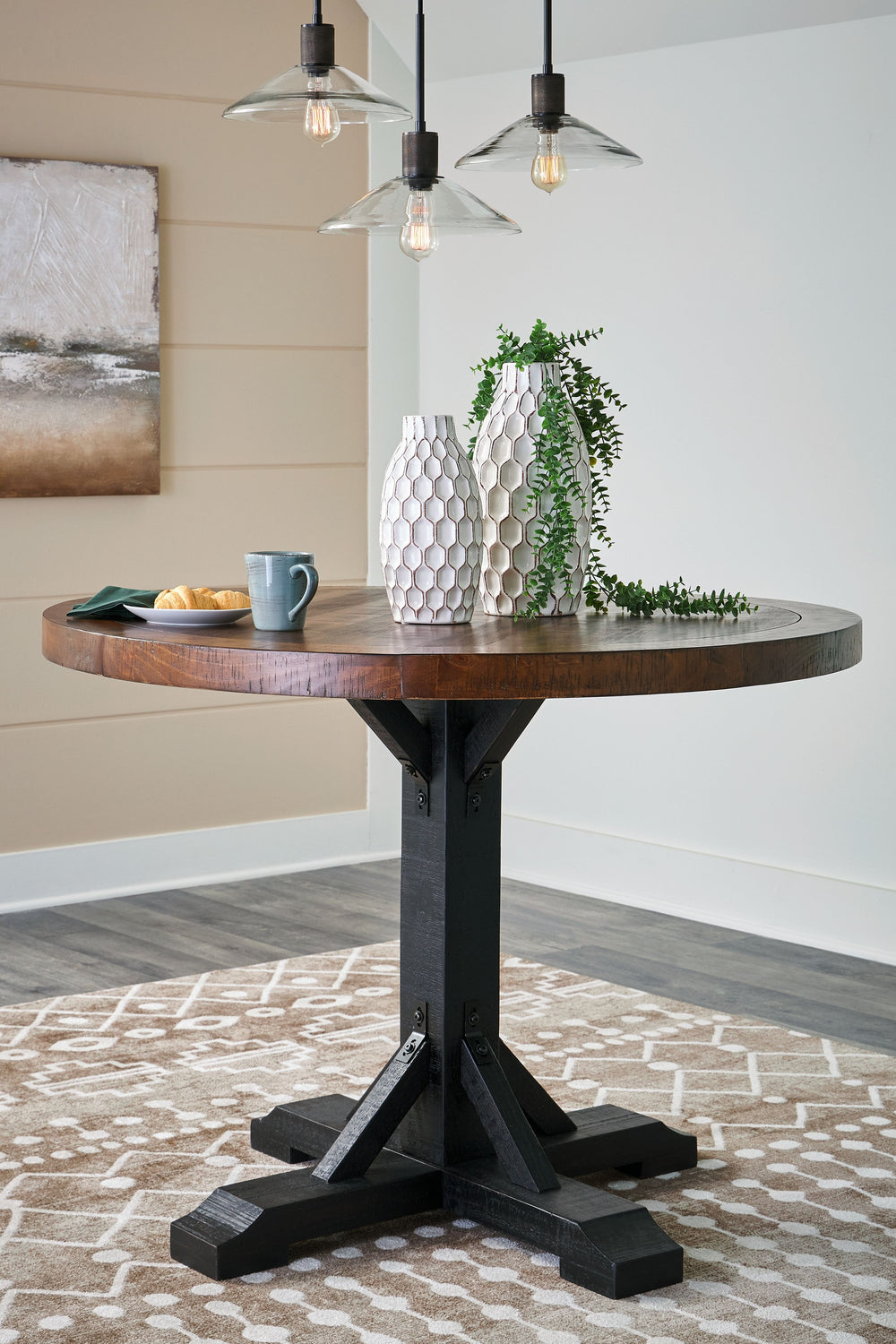 This set serves up the best in cottage styling. A charming choice, its two-tone finish is versatile enough for many casual aesthetics. Round counter height table features a sturdy post and bracket base design in a rustic black finish with a thick 48-" rou