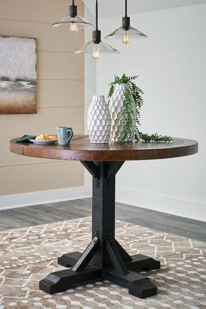  its two-tone finish is versatile enough for many casual aesthetics. Round counter height table features a sturdy post and bracket base design in a rustic black finish with a thick 48-" rou