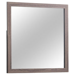 This dresser mirror offers a stylish and functional addition to any bedroom. Designed to pair with the matching dresser, its clean-lined rectangular frame enhances contemporary and modern spaces. Crafted from engineered wood with a durable laminate veneer