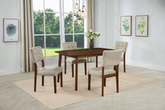 Transform your dining space with this elegantly designed dining set, where timeless craftsmanship meets modern comfort. Featuring a beautifully finished wooden table with rounded edges, this ensemble creates a warm and inviting atmosphere for family meals