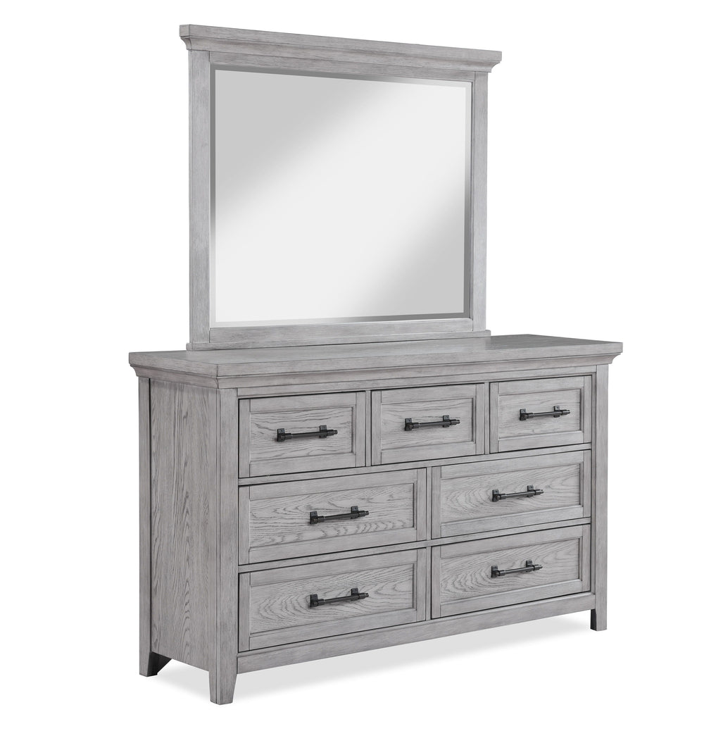 This bedroom suite offers a refreshing take on rustic charm, featuring a soft greige finish that highlights the natural wood grain. The sturdy bed stands as the centerpiece with its robust headboard and inviting design, while the accompanying pieces â€” a