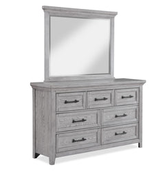 This bedroom suite offers a refreshing take on rustic charm, featuring a soft greige finish that highlights the natural wood grain. The sturdy bed stands as the centerpiece with its robust headboard and inviting design, while the accompanying pieces â€” a