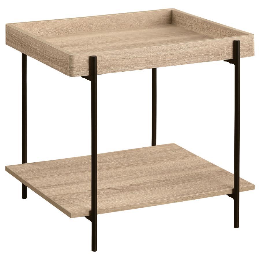 Infuse your space with the contemporary casual vibes of a modern end table, constructed from metal and engineered wood. This charming choice offers a tray-like table top that creates a sense of depth and dimension, perfect for refreshments or a decorative