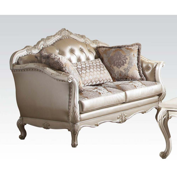 The Chantelle loveseat is filled with romantic wonder. This loveseat features a rose gold PU seat back, floral pattern and PU seat cushions, with pearl white wood finish, crystal like button tufted back, arms, and back, and tight back with loose seat cush