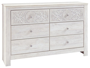 If itâ€™s coastal chic or cottage quaint style you long for, this whitewashed dresser invites you to go to town. Its distinctive weatherworn finish conveys an easy-breezy sensibility, perfect for a restful bedroom retreat. Tastefully edited lines and meda