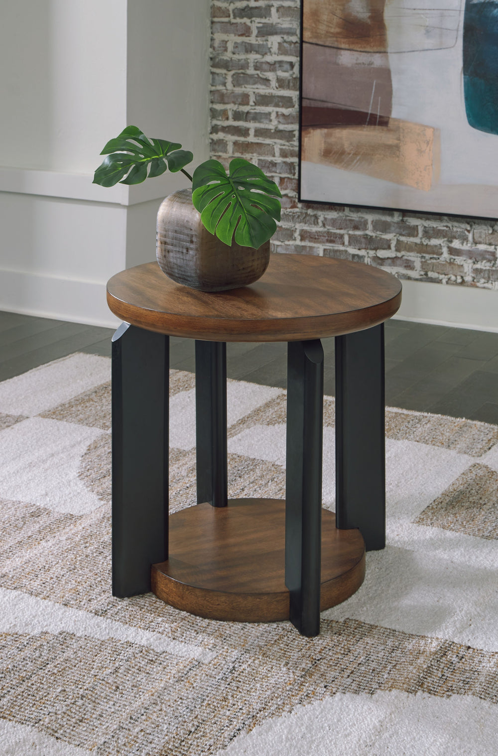 Experience the captivating allure of this end table, an effortless blend of casual and refined aesthetics. Its two-tone finish combines satin black with a rich brown wood tone for a modern, relaxed vibe that you-'ll love. Perfectly suited for your contemp