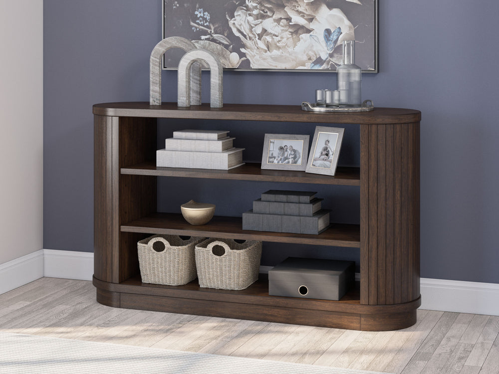 This credenza is perfectly modern in every way. Finished on both sides in a rich wood tone, the bookcase can be floated in a room or used as a divider. Adjustable shelving and open storage deliver a well-organized space for work-from-home professionals. I