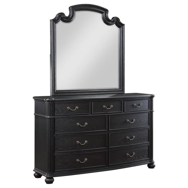 Elevate your bedroom-'s ambiance with this nine-drawer dresser, a piece that melds classic style with ample storage. The top drawers are felt-lined, offering a soft enclosure for jewelry and treasured items. Each drawer slides out smoothly, allowing for e