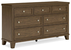 This dresser is well-suited to everyday living with its expertly balanced approach to style and function. Take the stress out of decoratingâ€”a classic medium brown finish easily pairs with existing furniture pieces. And its timeless design stays in style
