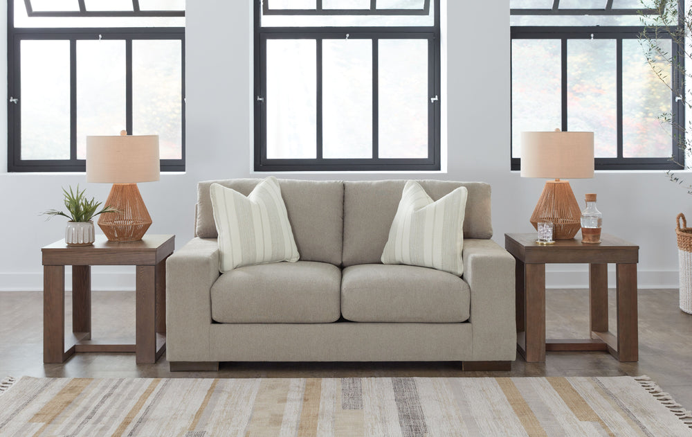 Classic comfort gets a mod twist with this loveseat. Its minimalistic approach and structured silhouette bring a clean-lined design element to your living room. Sink into the positively plush cushions while relaxing solo, or curl up with a glass of wine w