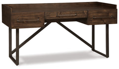 For fans of urban industrial design, this desk steals the show. Its top is crafted with a mix of acacia veneer and wood beautified with an oiled walnut-tone finish. A sleek tubular metal frame and linear, large-scale pulls pull it all together. The cutout