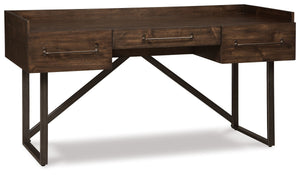 For fans of urban industrial design, this desk steals the show. Its top is crafted with a mix of acacia veneer and wood beautified with an oiled walnut-tone finish. A sleek tubular metal frame and linear, large-scale pulls pull it all together. The cutout