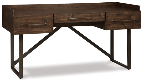 For fans of urban industrial design, this desk steals the show. Its top is crafted with a mix of acacia veneer and wood beautified with an oiled walnut-tone finish. A sleek tubular metal frame and linear, large-scale pulls pull it all together. The cutout