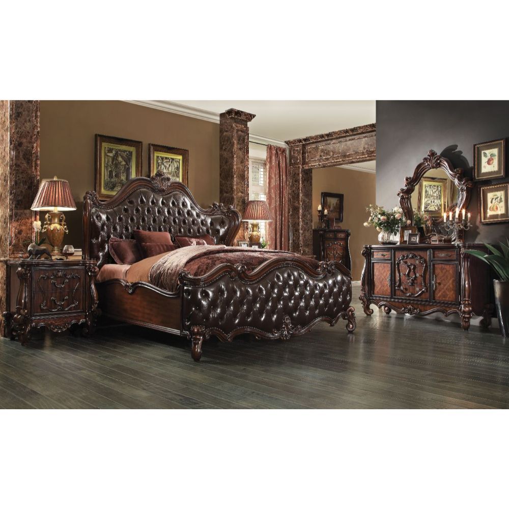 Sleep like royalty with this Versailles Bed Set. The bedroom set was inspired by old European design. The Bed features carved scrollwork accent with nailhead trim Decor and tufted upholstery on both headboard and footboard. The accent pieces crafted in wo